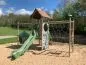 Preview: Lumka slide side play structure in a playground Preview: Lumka slide side play structure in a playground